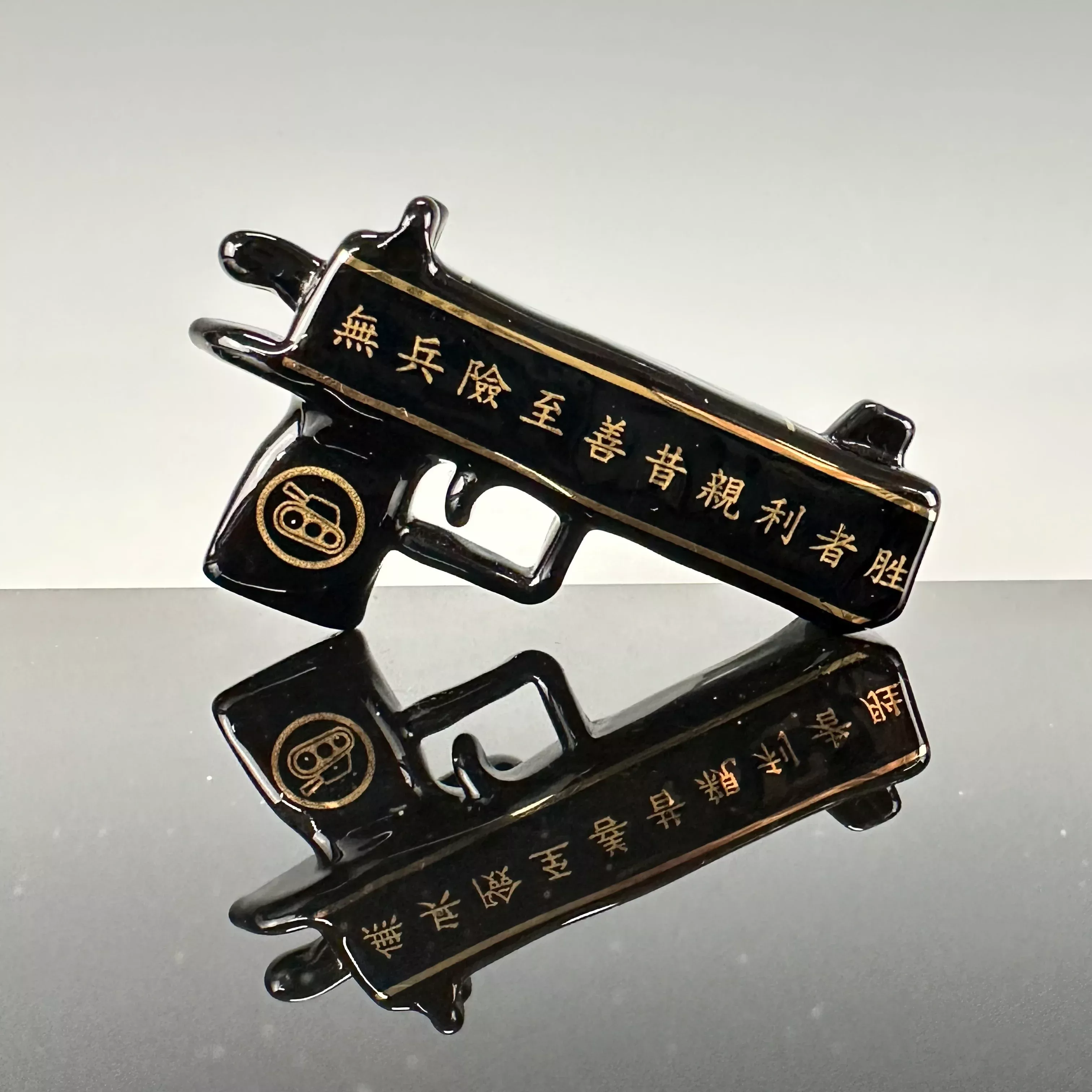 "Art of War" Gun Pendant by Sokol